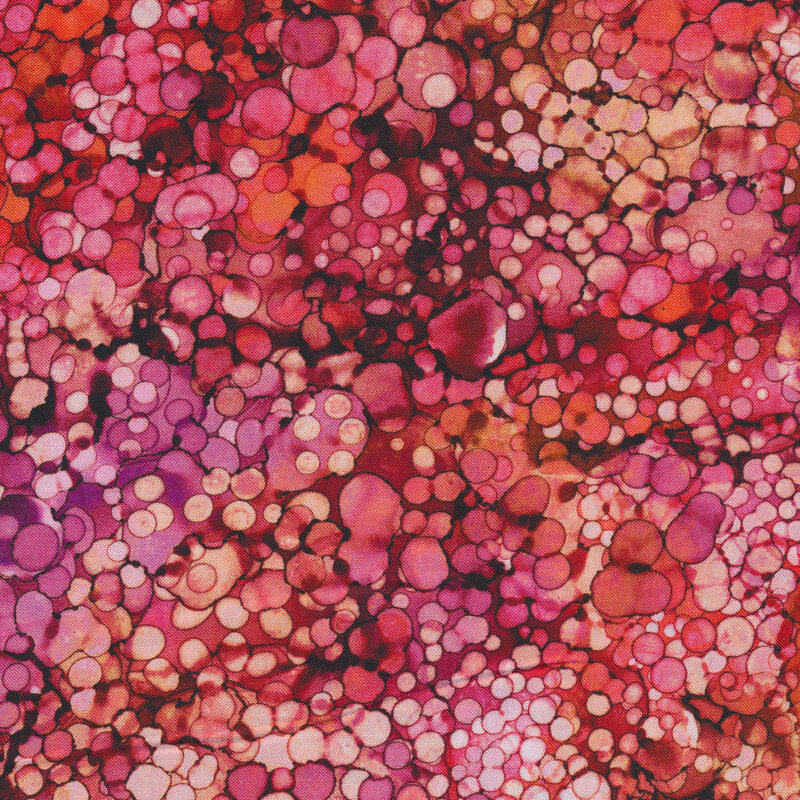 Dark red and pink marbled fabric with small dots all over