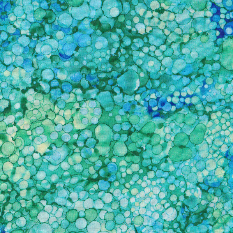 Blue and aqua marbled fabric with small circles all over
