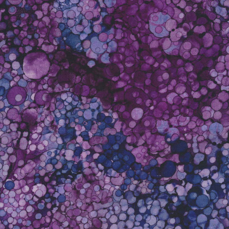 Dark purple tonal marbled fabric with small circles all over