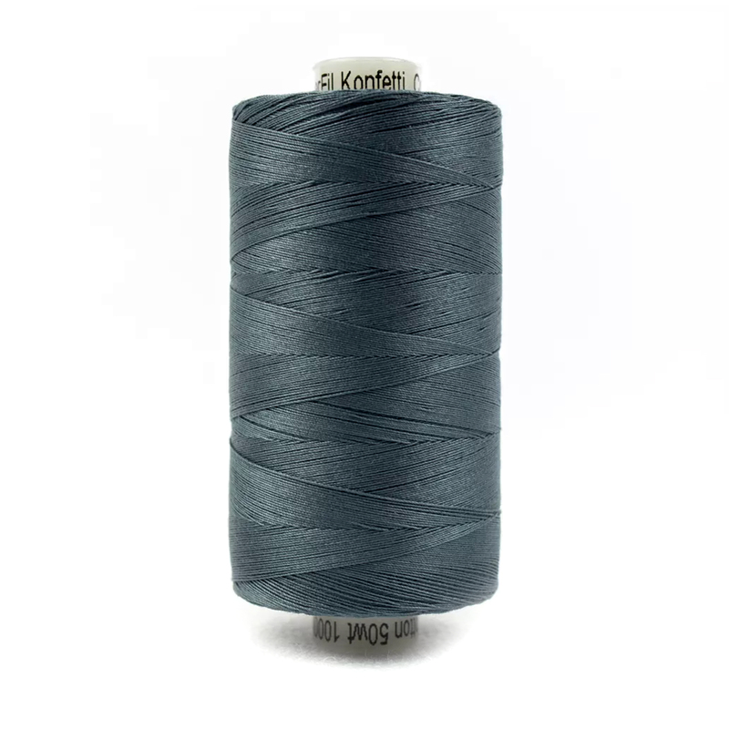 A spool of Konfetti Kt904 - Blue Grey thread on a white background