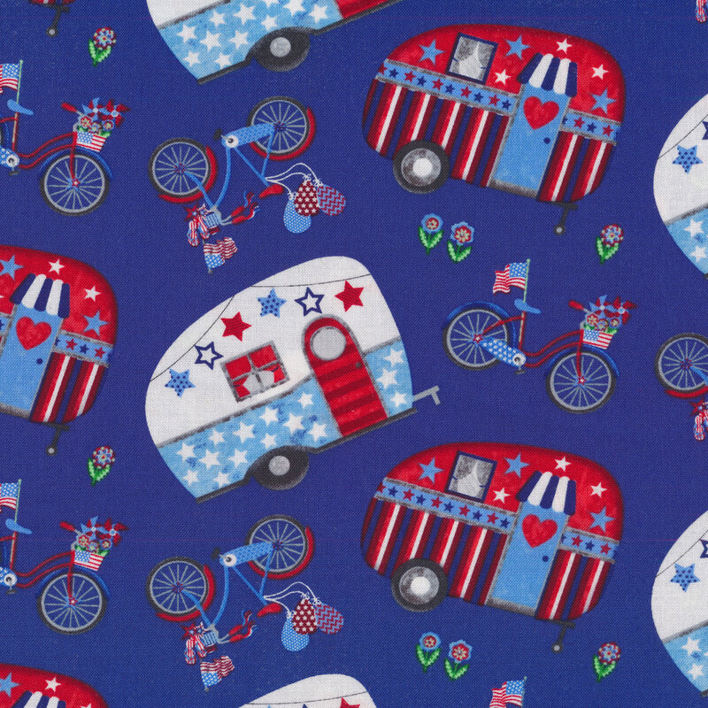 Patriotic bikes and campers tossed on a blue background
