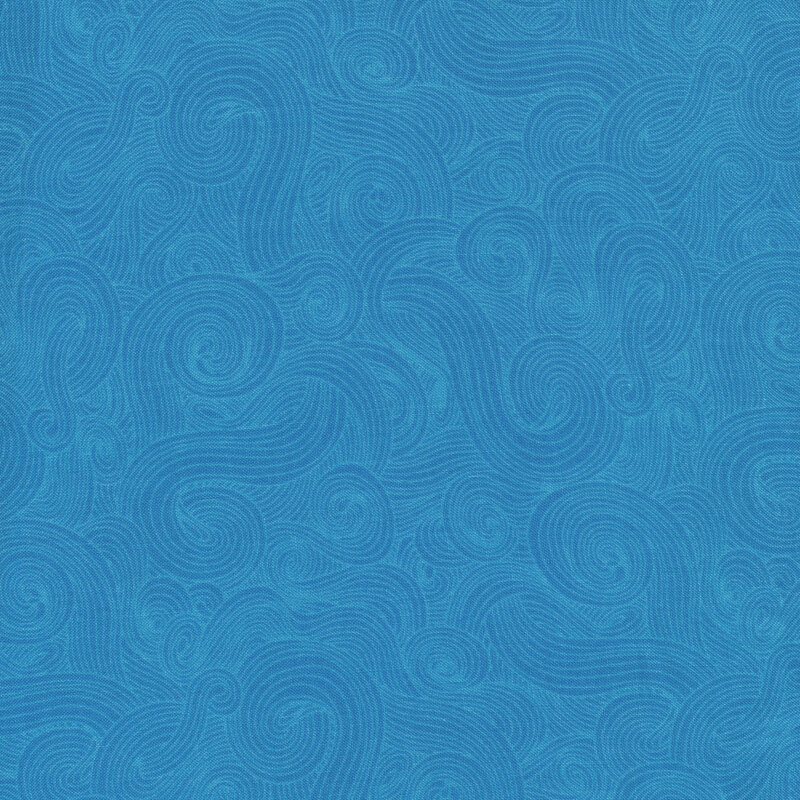 Tonal sky blue fabrics with dark swirls on a light background