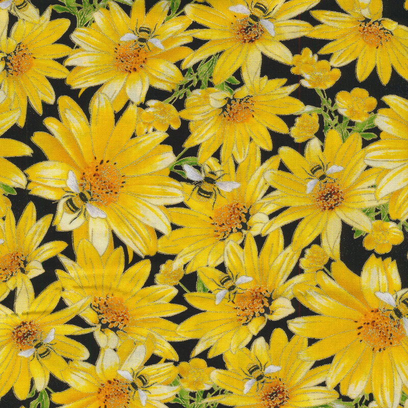 Fabric with bumblebees enjoying bright yellow flowers on a black background