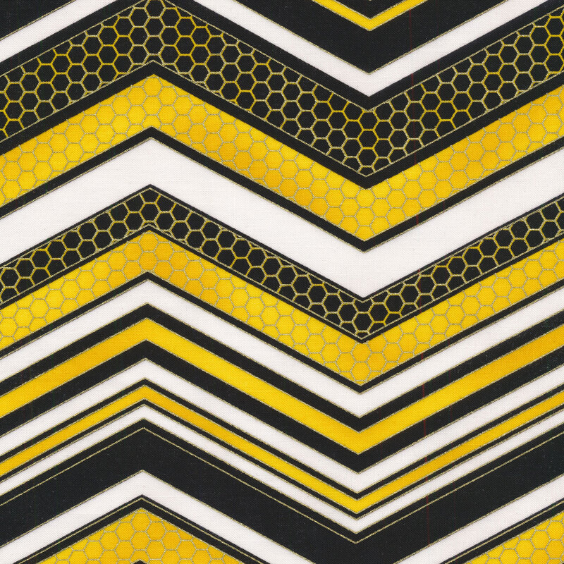 Black, white, and yellow zig zagged fabric with honeycomb texturing