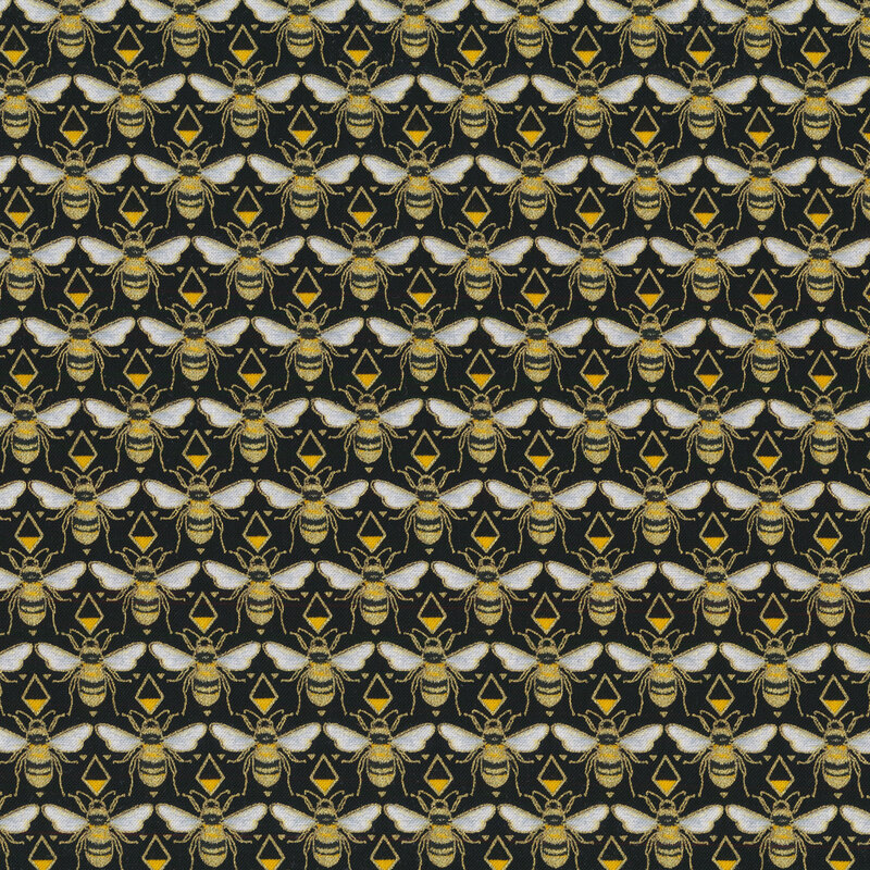 Fabric with rows of bumblebeees and yellow diamonds on a black background