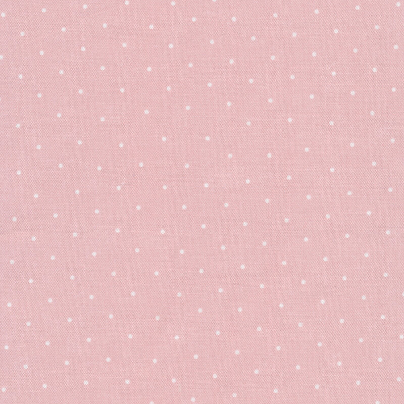 Pink fabric with white polka dots