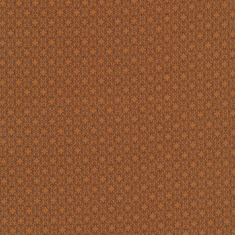 Tonal brown swirled star lattice patterns on a lighter brown background