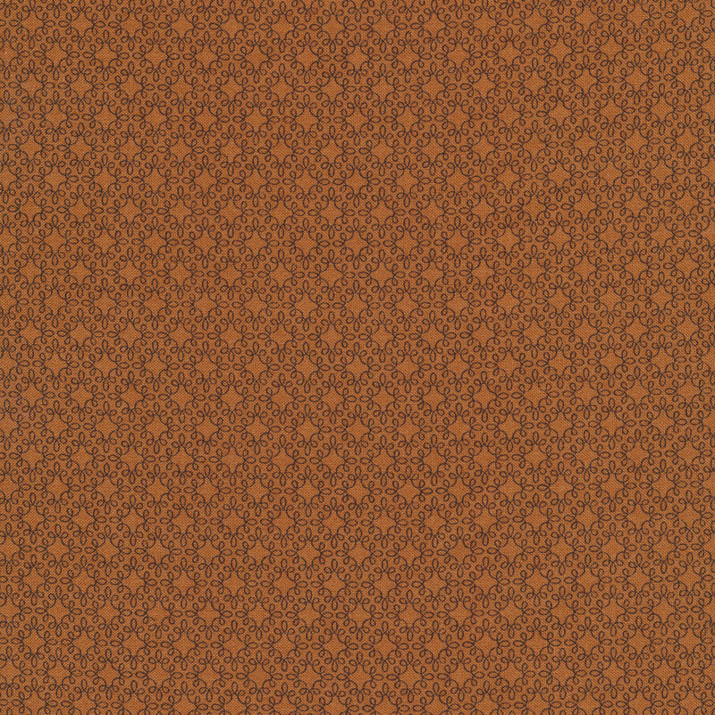 Tonal brown swirled star lattice patterns on a lighter brown background
