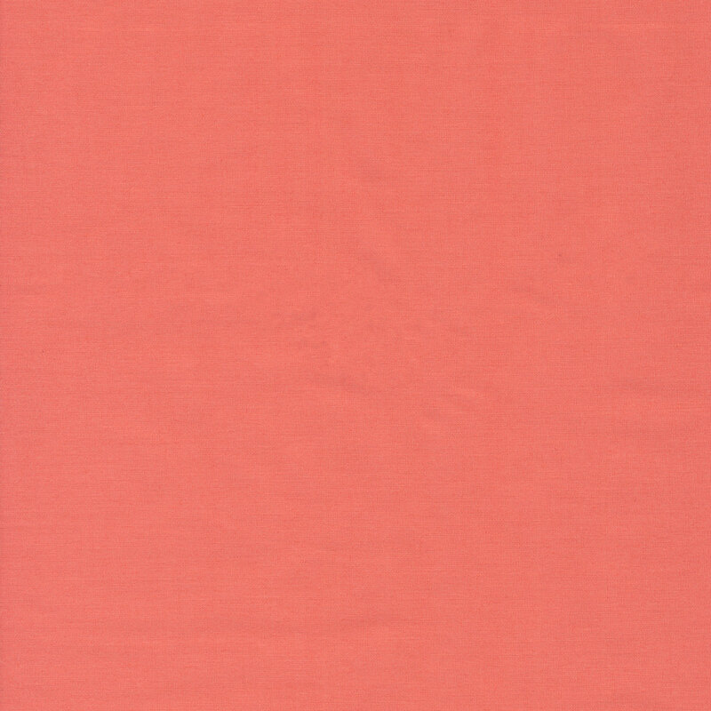 Swatch of solid pink colored fabric