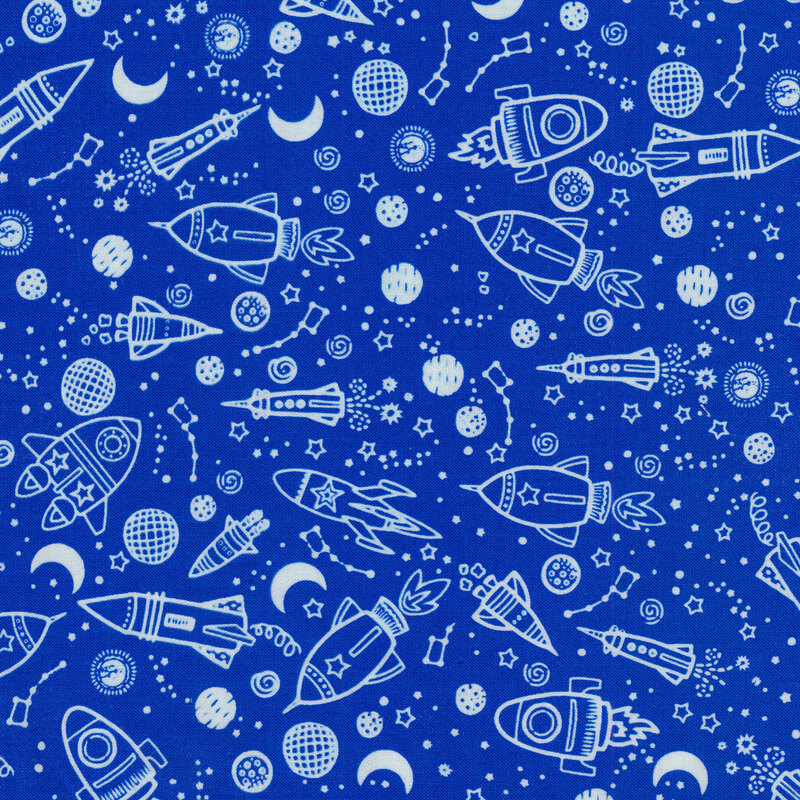 constellations, spaceships and moons on a blue fabric background