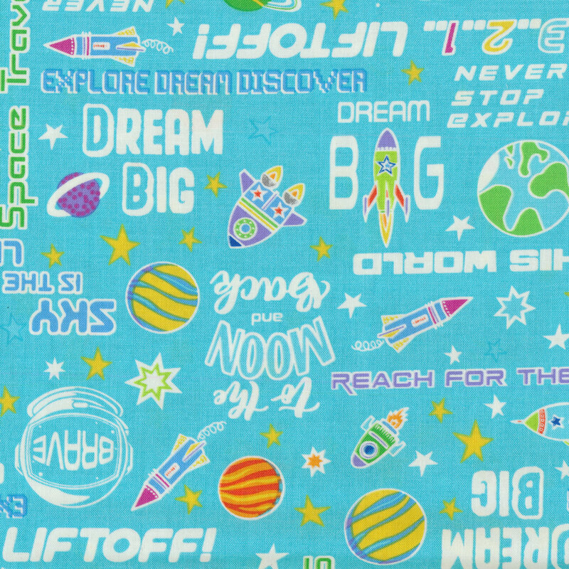 phrases, planets and spaceships all over a turquoise fabric background