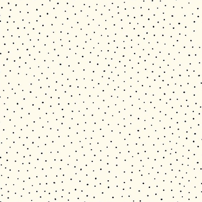 Small black polka dots on a cream background