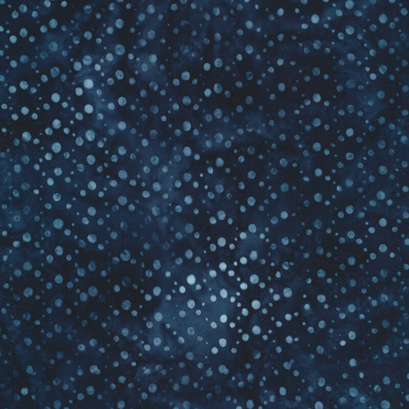 Light blue mottled dots all over a dark blue background