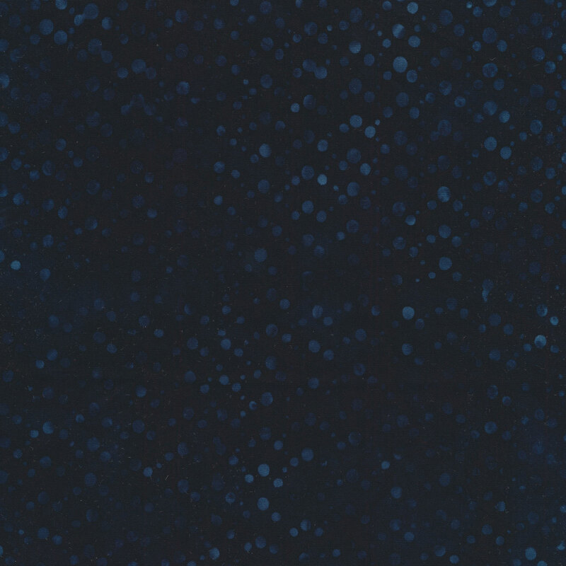 Blue dots all over a dark blue marbled background