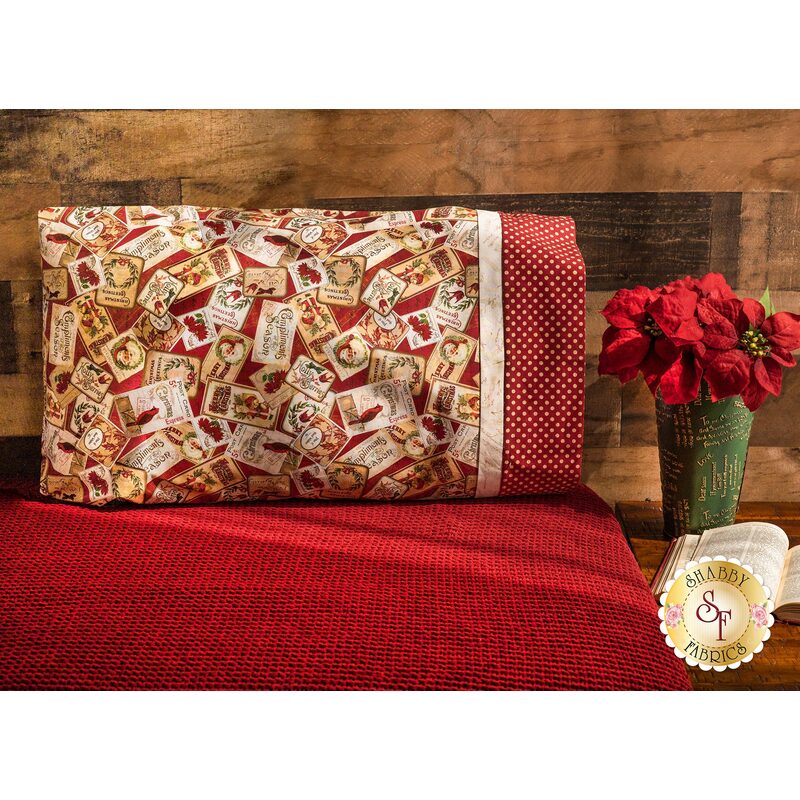 The adorable Things That Go Magic Pillowcase on a bed