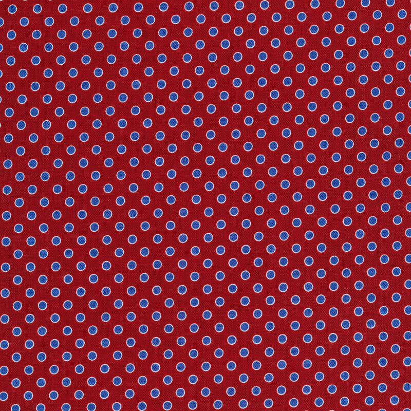 Navy polka dots with a red background