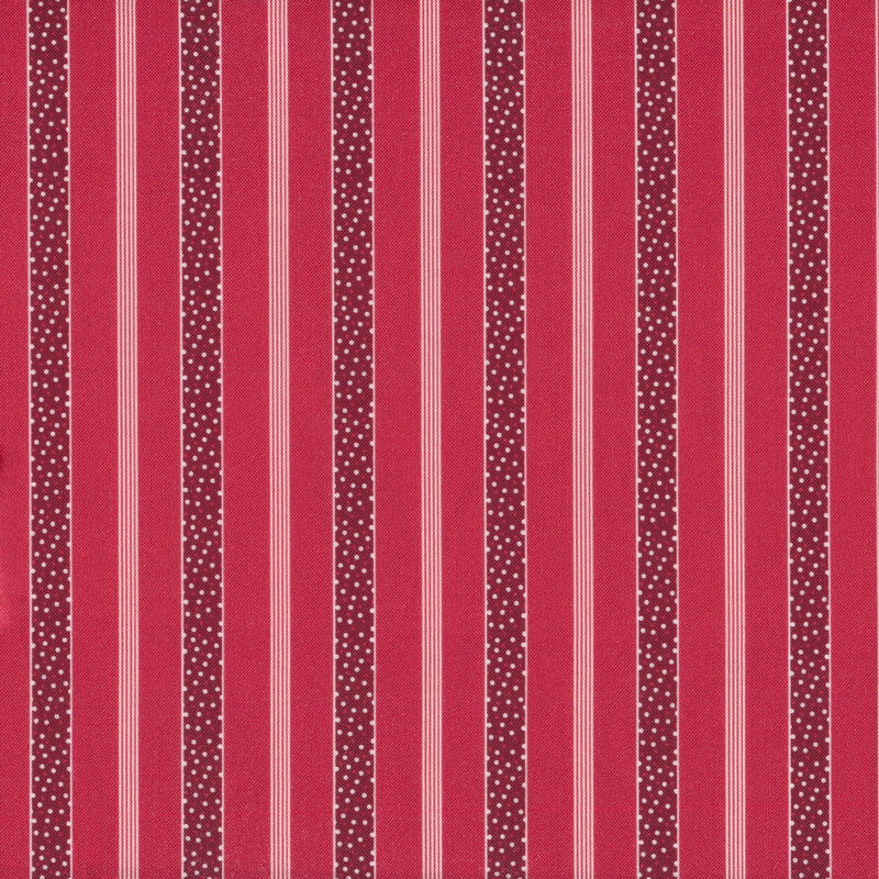 fabric with red, white and burgundy striped pattern with polka dots