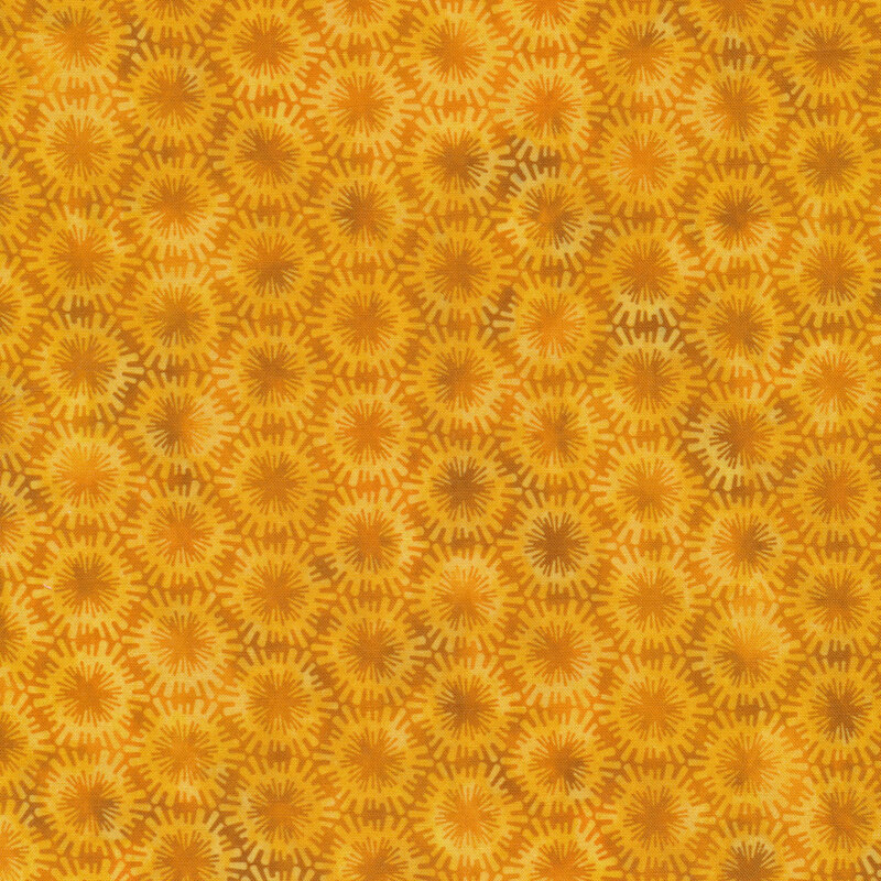 Gold and orange fabric with starburst designs