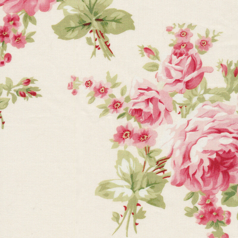 Cream colored fabric with large pink roses and green vines