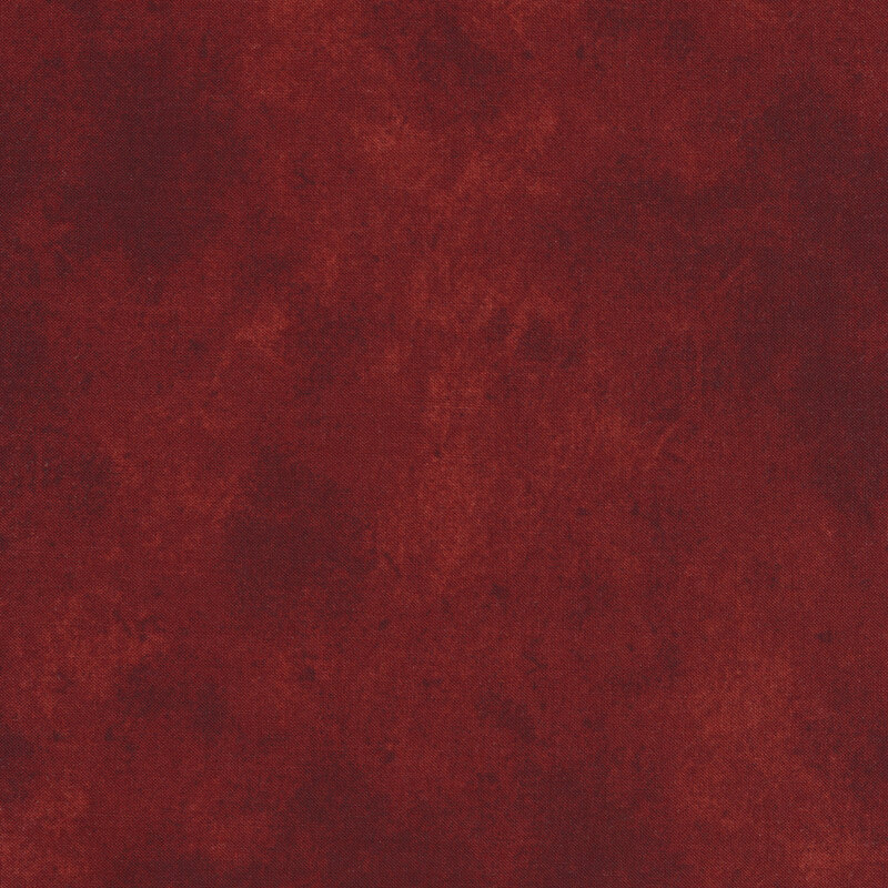 Red tonal cotton fabric.
