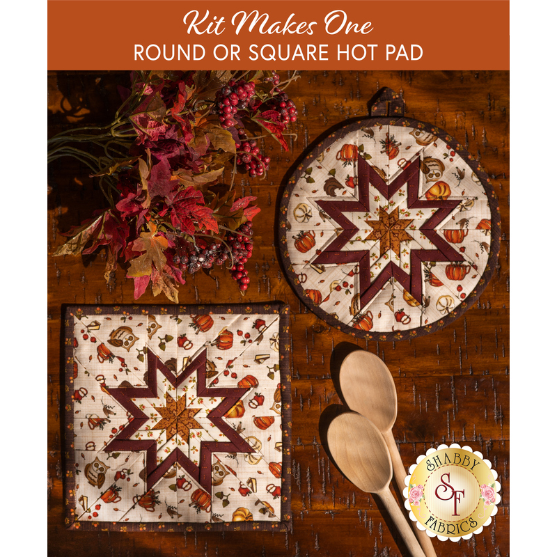 Two off-white hot pads patterned with fall seasonal imagery, featuring a folded central star.
