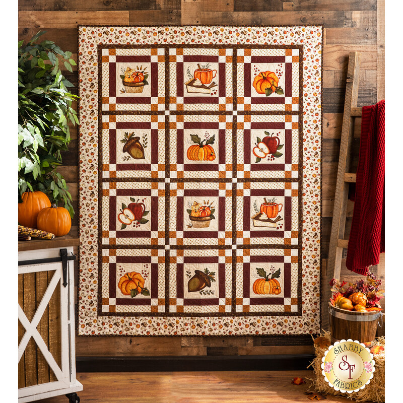 12 block quilt featuring fall themed imagery.