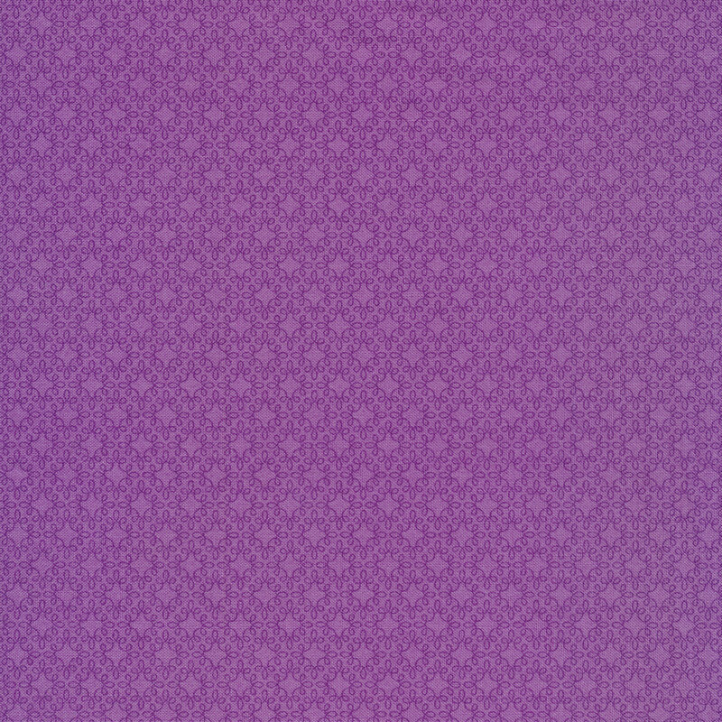 Purple tonal fabric with geometric swirl designs