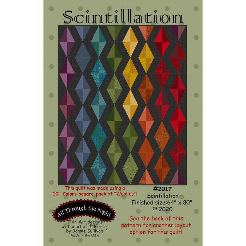 The front of the Scintillation pattern by All Through The Night featuring a quilt with brightly color diamond shapes on a black background.