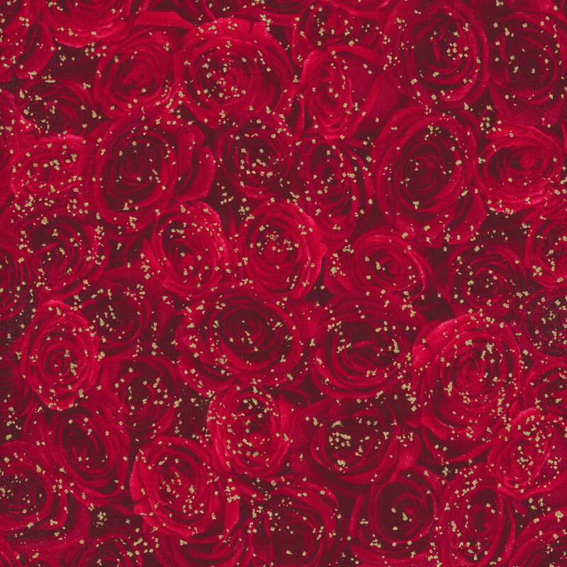 fabric with packed red roses all over and small gold metallic dot accents