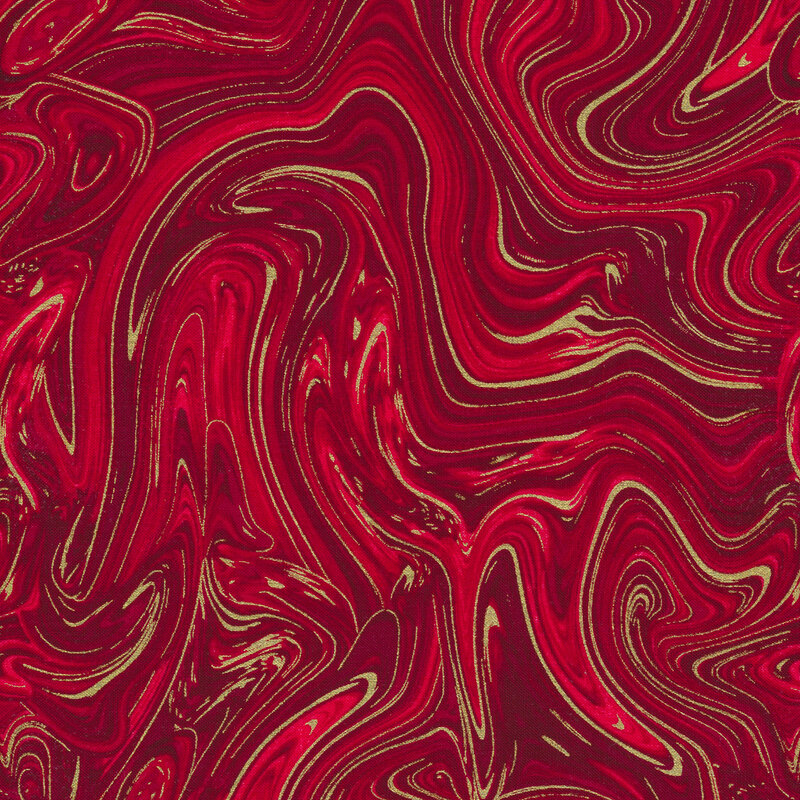 red and yellow swirled fabric with metallic accents