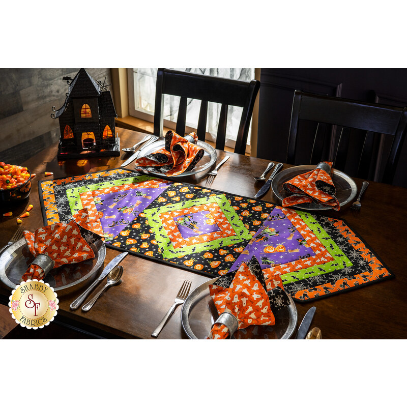 Halloween themed table runner and matching napkins.