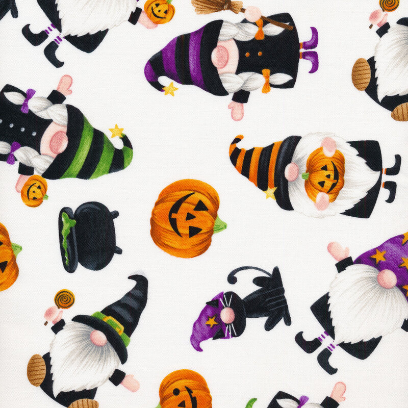White fabric with Halloween gnomes, pumpkins, and cats
