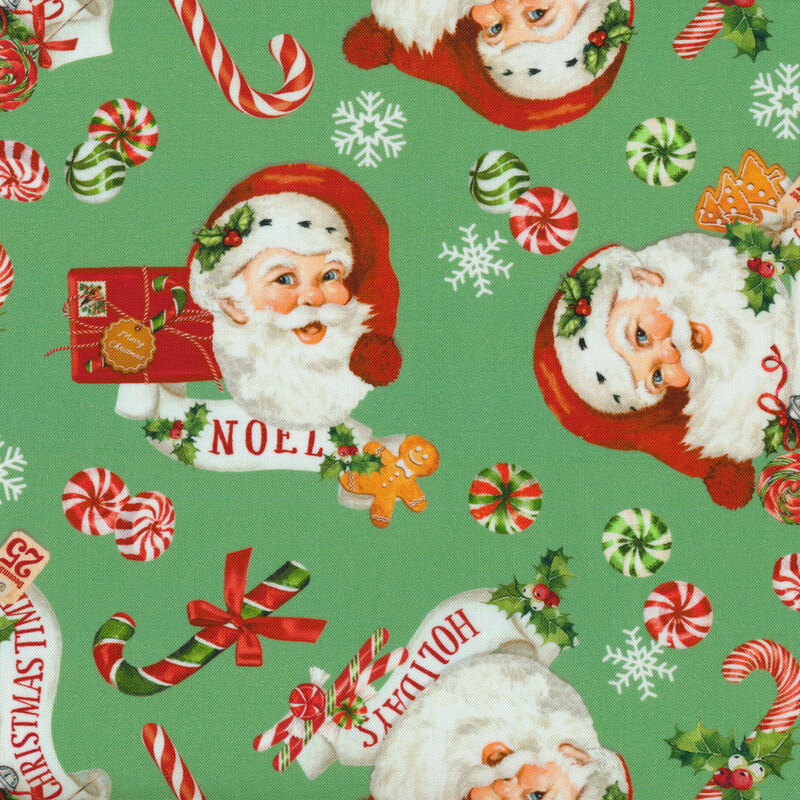 Green fabric with peppermint candy, candy cane's and a vintage Santa Claus