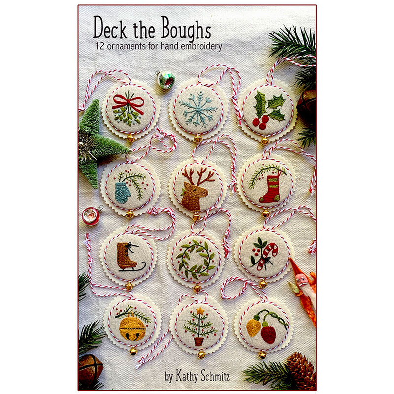 The front of the Deck the Boughs pattern showing all 12 hand embroidered ornaments