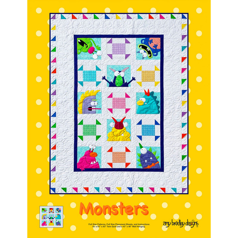 The front of the Monsters Quilt pattern showing a white monster quilt on a yellow background