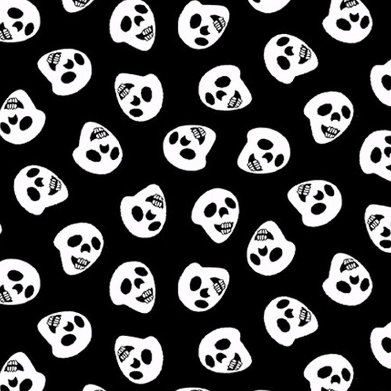 Black fabric with white Halloween skulls