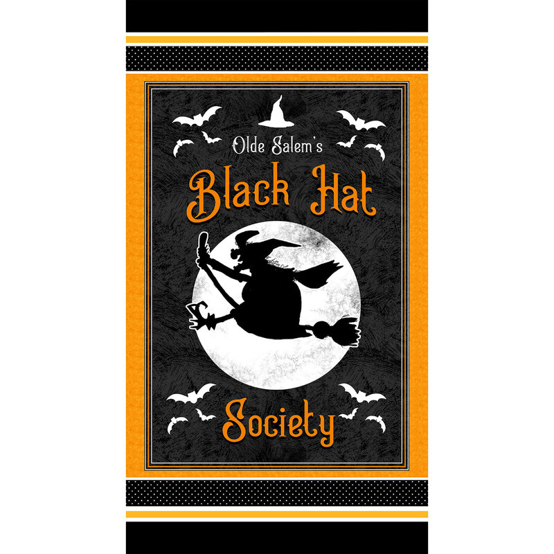 A Halloween fabric panel with a witch riding her broomstick in front of the moon on a black background