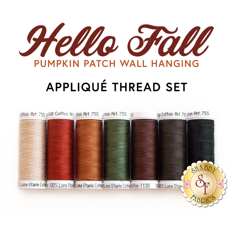 row of earth tone thread spools