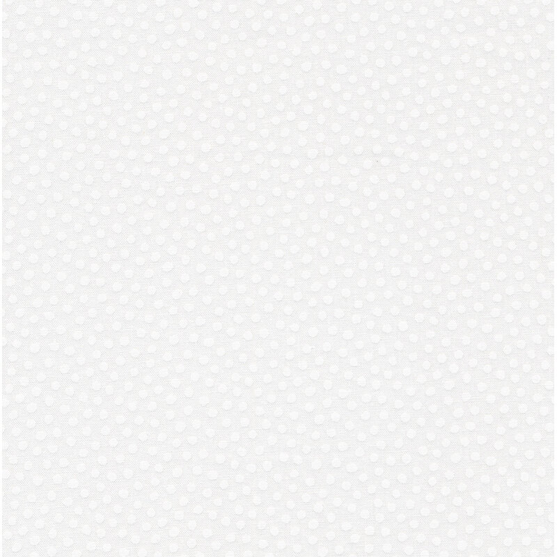 White dots on white fabric