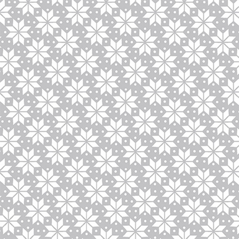 White geometric snowflakes and small polka dots all over a gray background