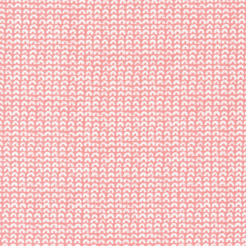 White textured half rings on a pink background