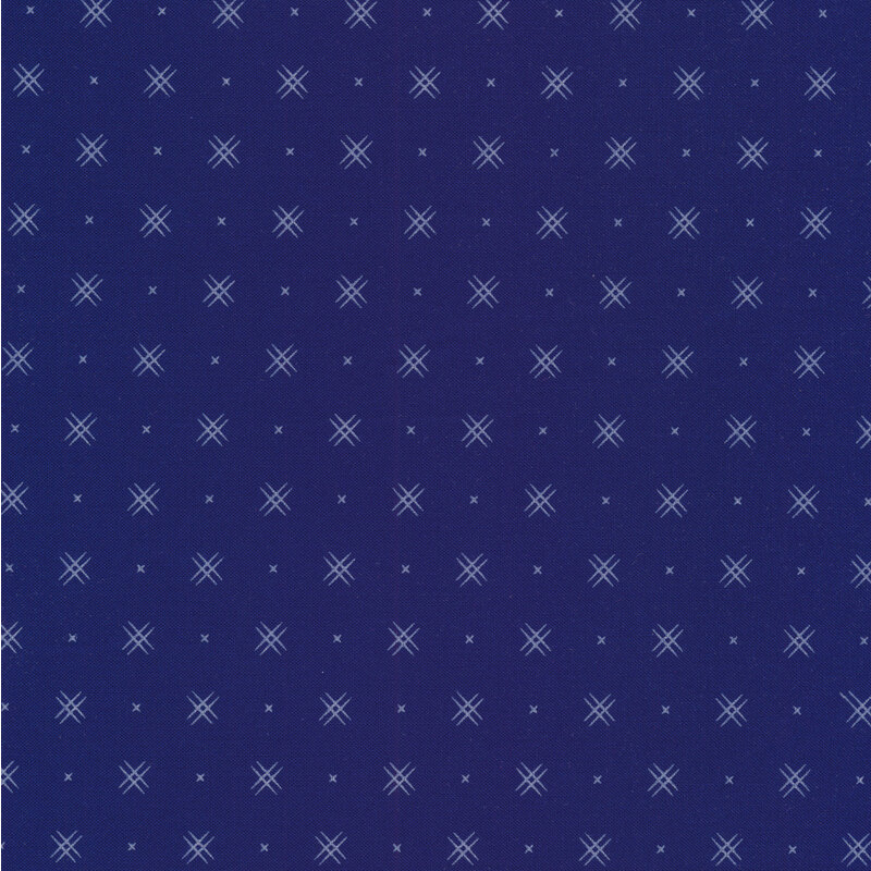 Royal blue fabric with rows of alternating small x's and double criss cross designs