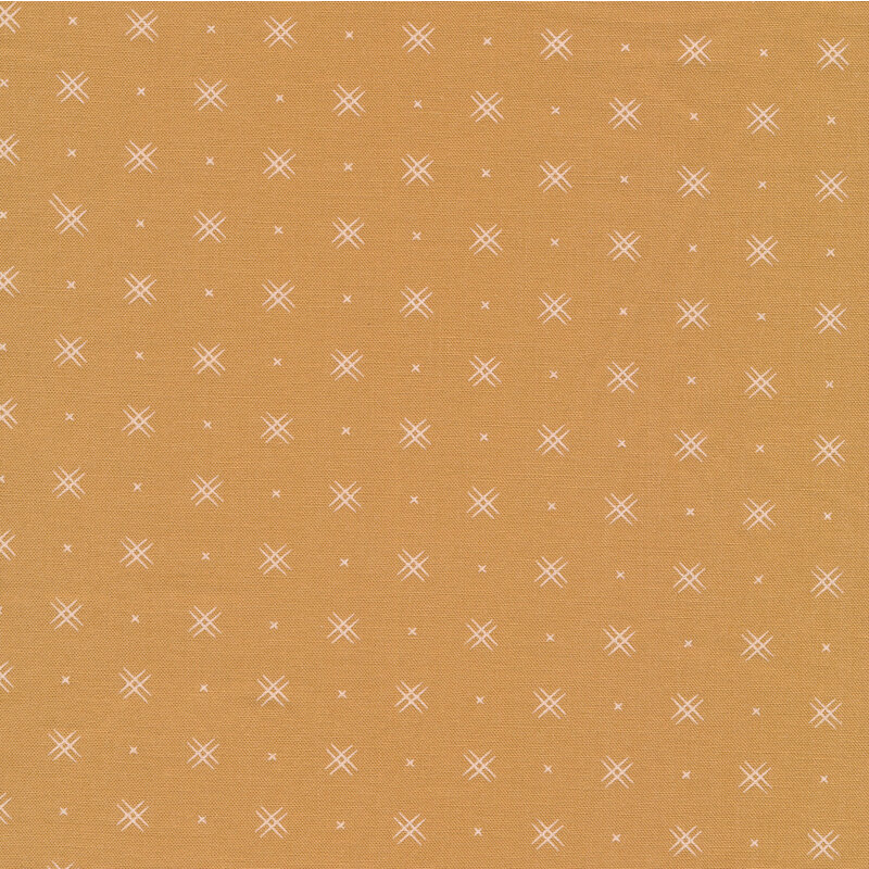 Light brown fabric with rows of small white x's and double criss-cross patterns