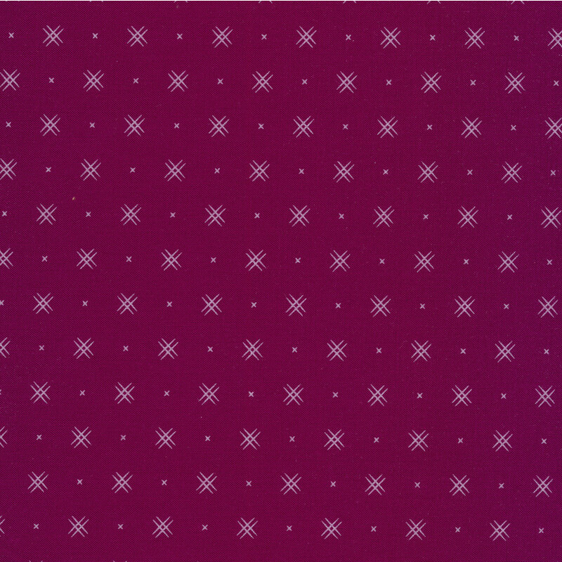 Boysenberry colored fabric with rows of small white x's and double criss-cross patterns