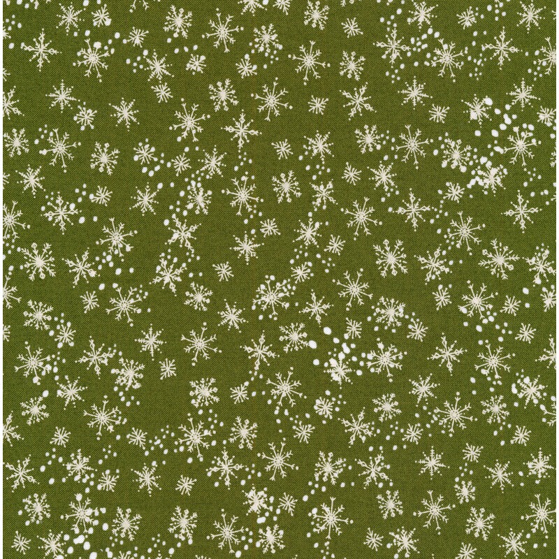 cream snowflakes on sage green background.