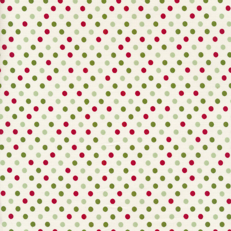 Red and green polka dots on a cream background
