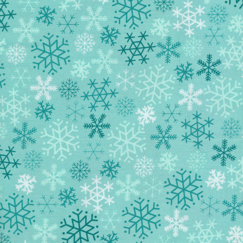 Aqua fabric with dark teal and white snowflakes all over