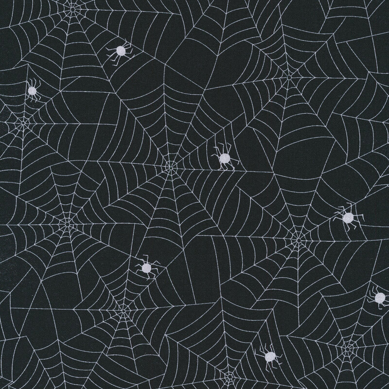Fabric featuring Grey spider webs and spiders on a black background