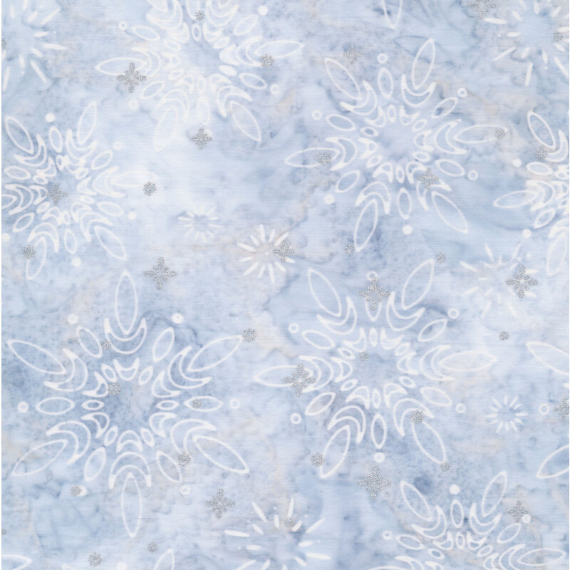 Light blue mottled batik with white snowflakes and small stars