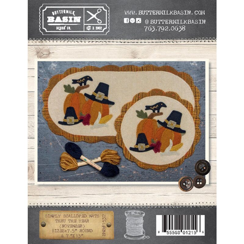 The front of the Simply Scalloped Mat pattern for November showing the finished mats side by side with the same wool applique pumpkins, pilgrims hats, crow, apple and an ear of corn.